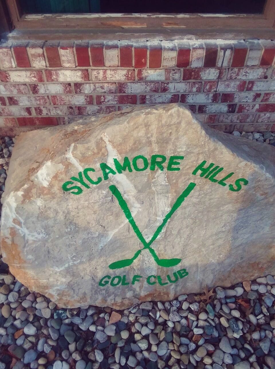 Rock with Sycamore Hills painted on
